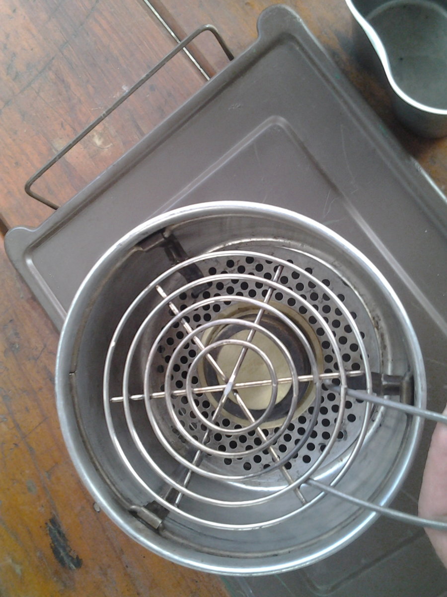 trangia kit grid in place with grid lifter.jpg